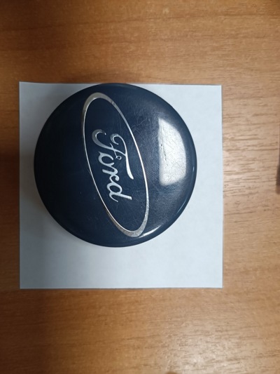 логотип к литым дискам Ford - фото
